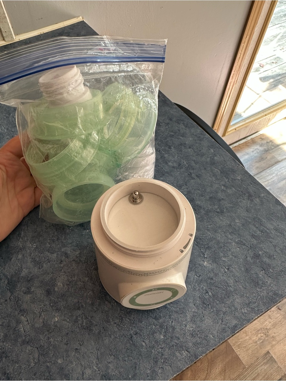 Momcozy travel bottle warmer